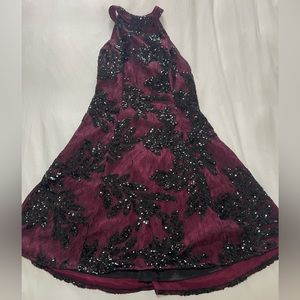 Small DO+BE sparkly burgundy and black dress.